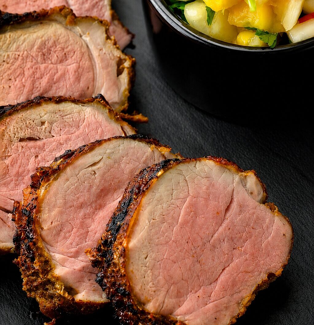 Sous vide masala crusted pork tenderloin with mango scotch bonnet salsa