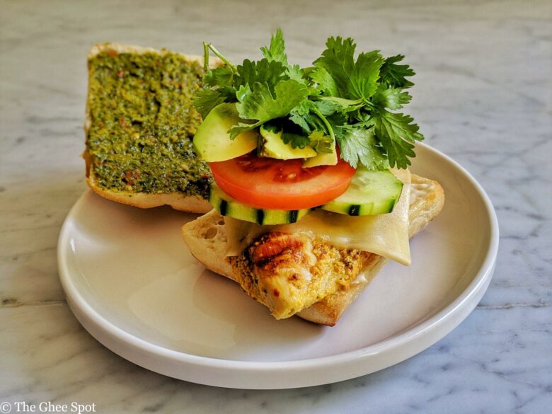 Flavorful grilled chicken tikka in a sandwich.