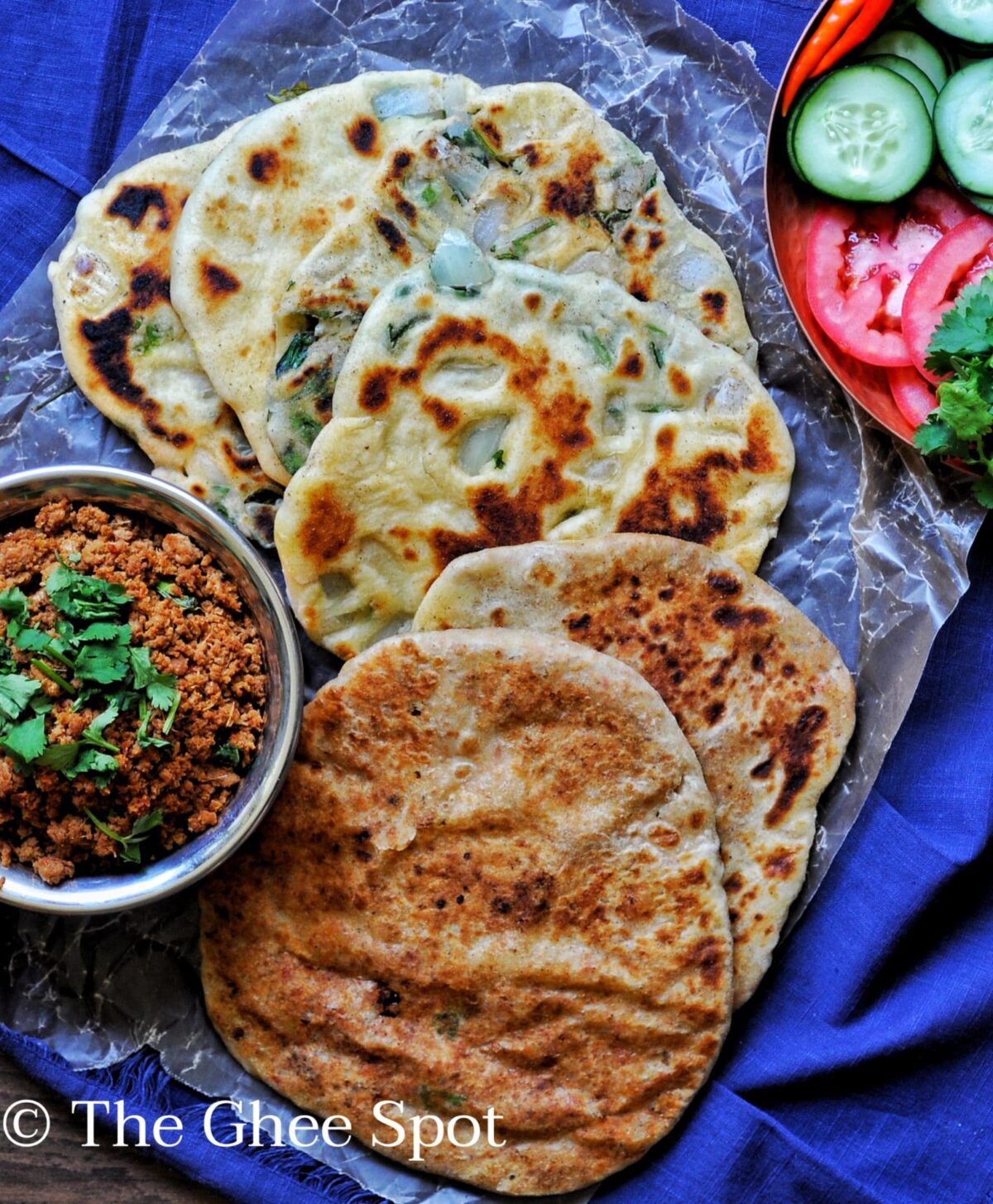 Griddle cooked keema stuffed kulcha.