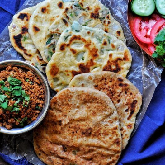 Griddle cooked keema stuffed kulcha.