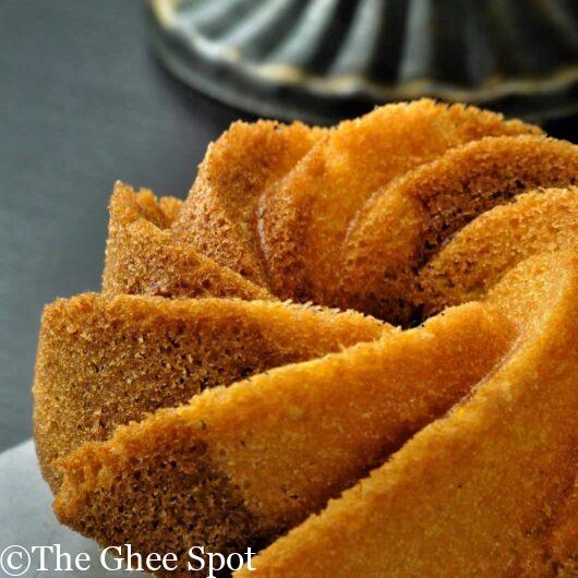 This is a light, airy, spongy, coffee, cocoa, orange, and cardamom bundt cake.