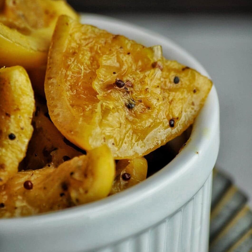 Nimbu da achar or lemon pickle, is tangy, savory, with a hint of spice from the ginger, chilies, and mustard seed. It's the perfect Punjabi condiment