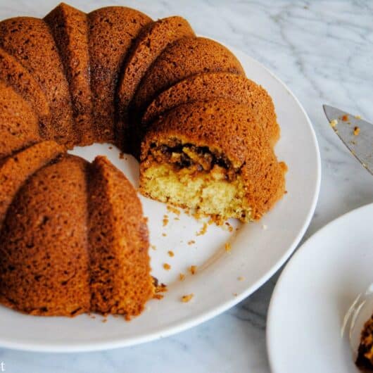 Light, moist, and airy coffee cake with a brown sugar and walnut filling.