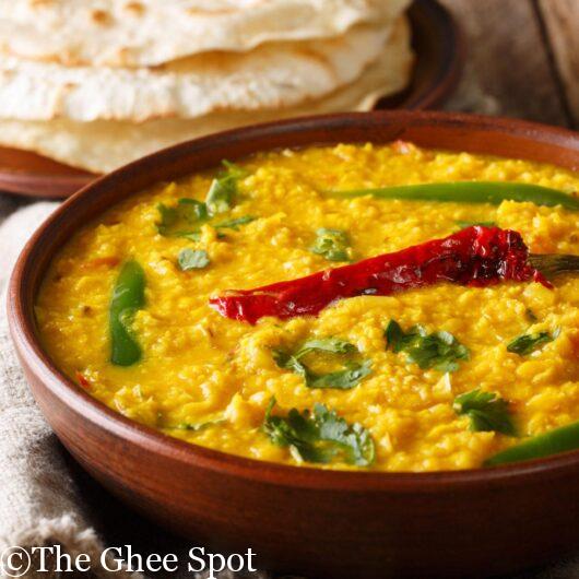 Creamy stewed lentils with a spicy tadka on top.