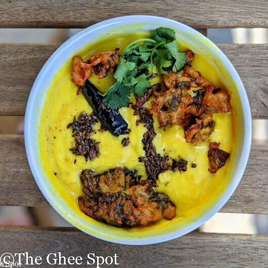 A traditional spicy stew with yogurt and gram flour