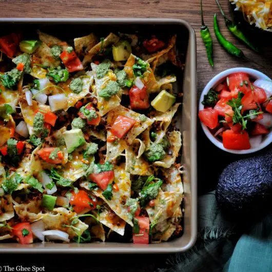 Keema plus mint chutney, tamarind chutney, pico de gallo, and nachos, that's heaven in a tray.
