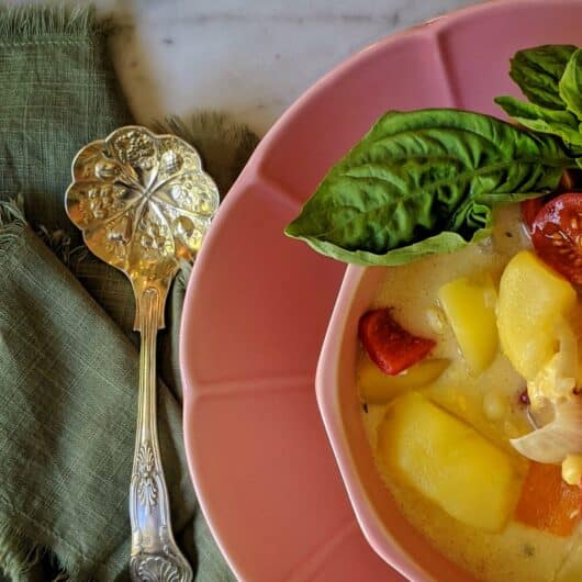 A light corn, bell pepper, and potato chowder perfect winter or summer.
