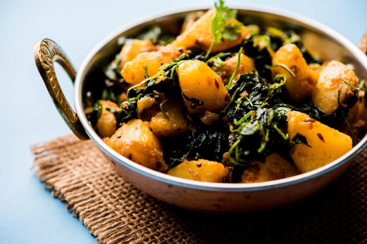 Savory and earthy fenugreek stir fried with potatoes. Methi Aloo is fast and easy