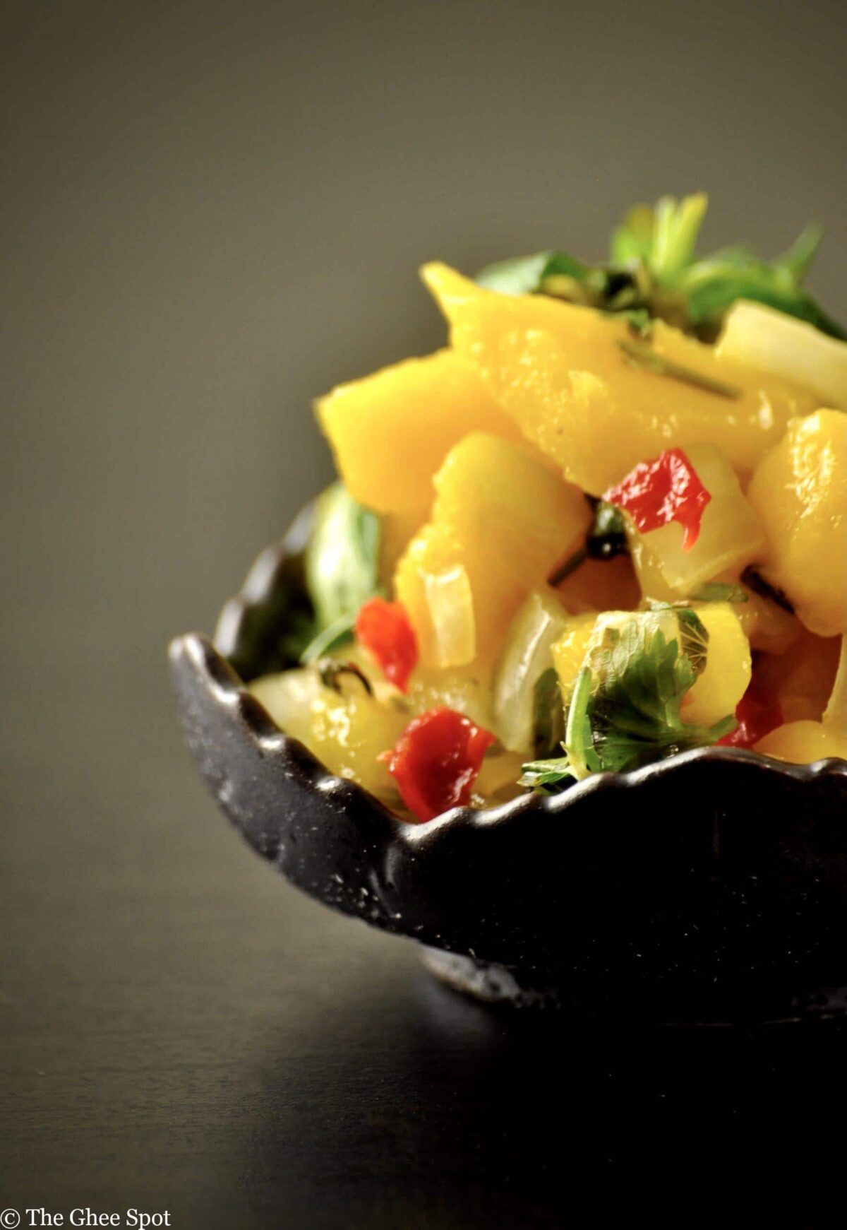 Spicy, savory, with a hint of delicious mango sweetness. Mango Scotch Bonnet salsa is delicious!