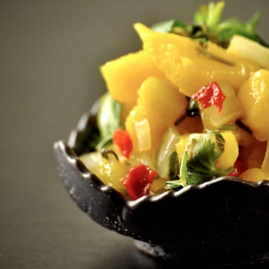 Spicy, savory, with a hint of delicious mango sweetness. Mango Scotch Bonnet salsa is delicious!