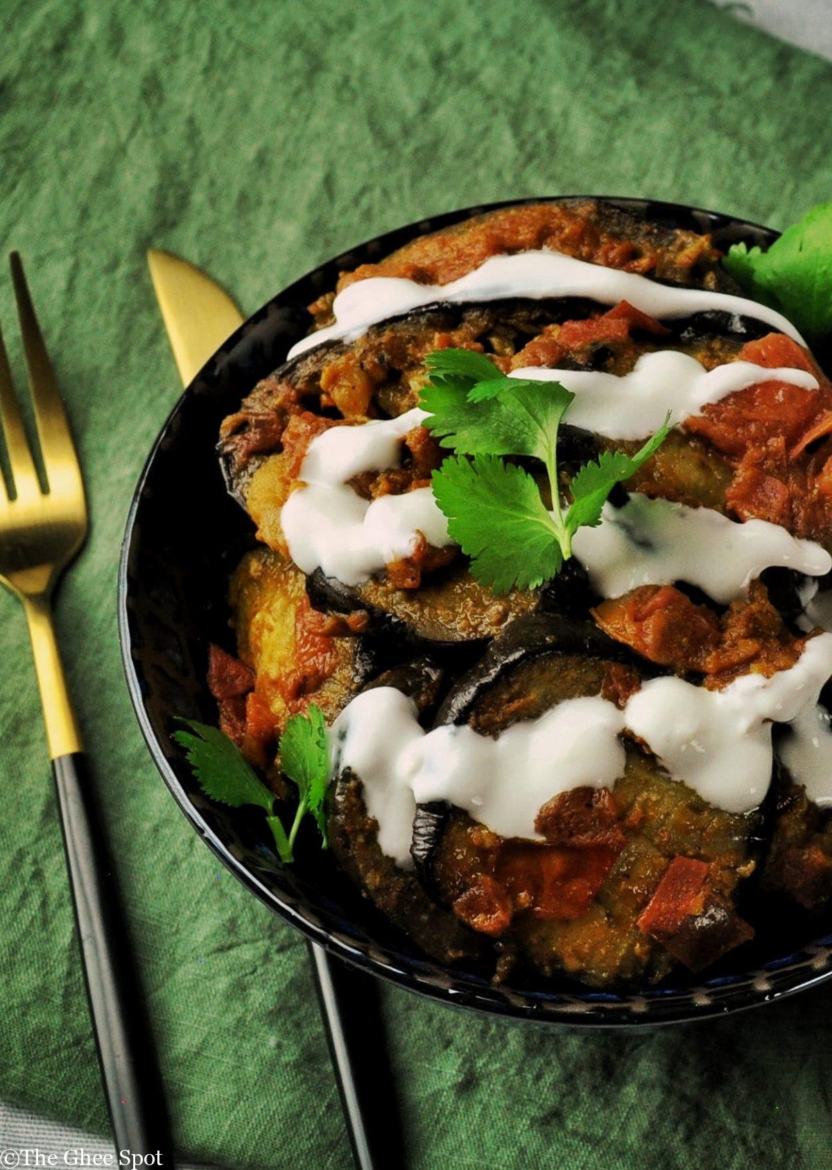 Savory stewed eggplant with tomatoes, garlic, and spices.