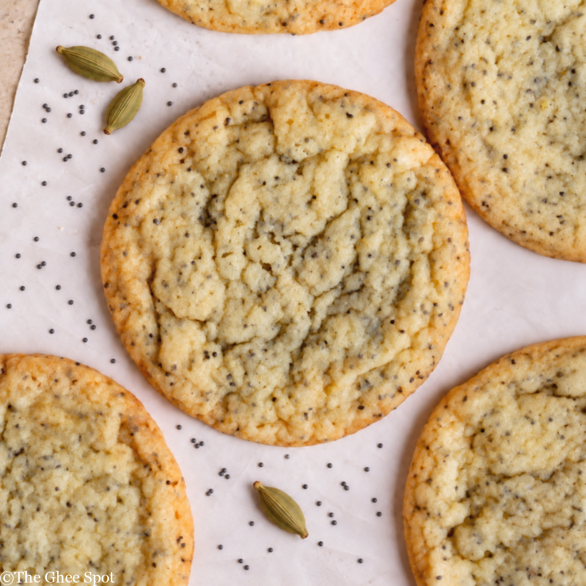 Chewy, soft, delicious cardamom poppy seed biscuits with a hint of orange.