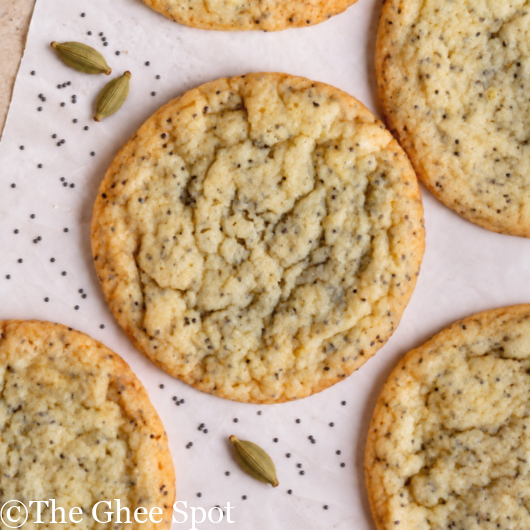 Chewy, soft, delicious cardamom poppy seed biscuits with a hint of orange.